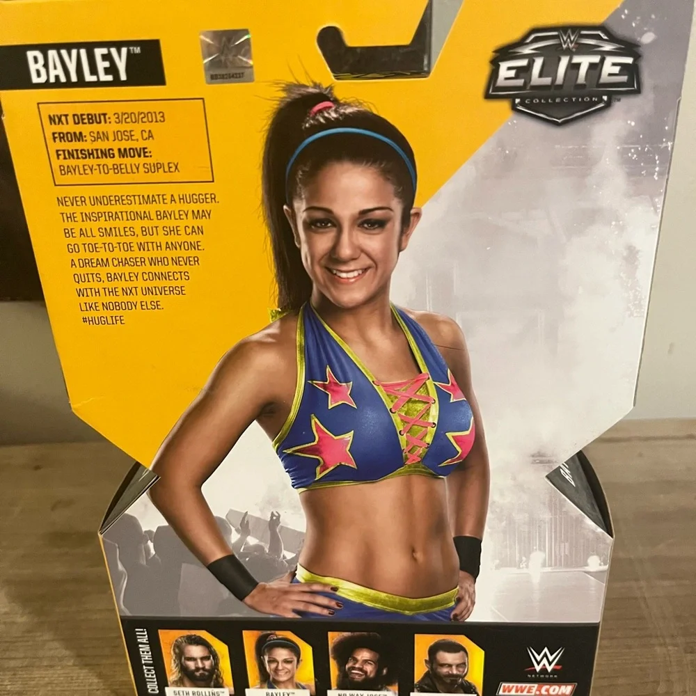 WWE Bayley‎ Elite Figure with Blue and Yellow Attire